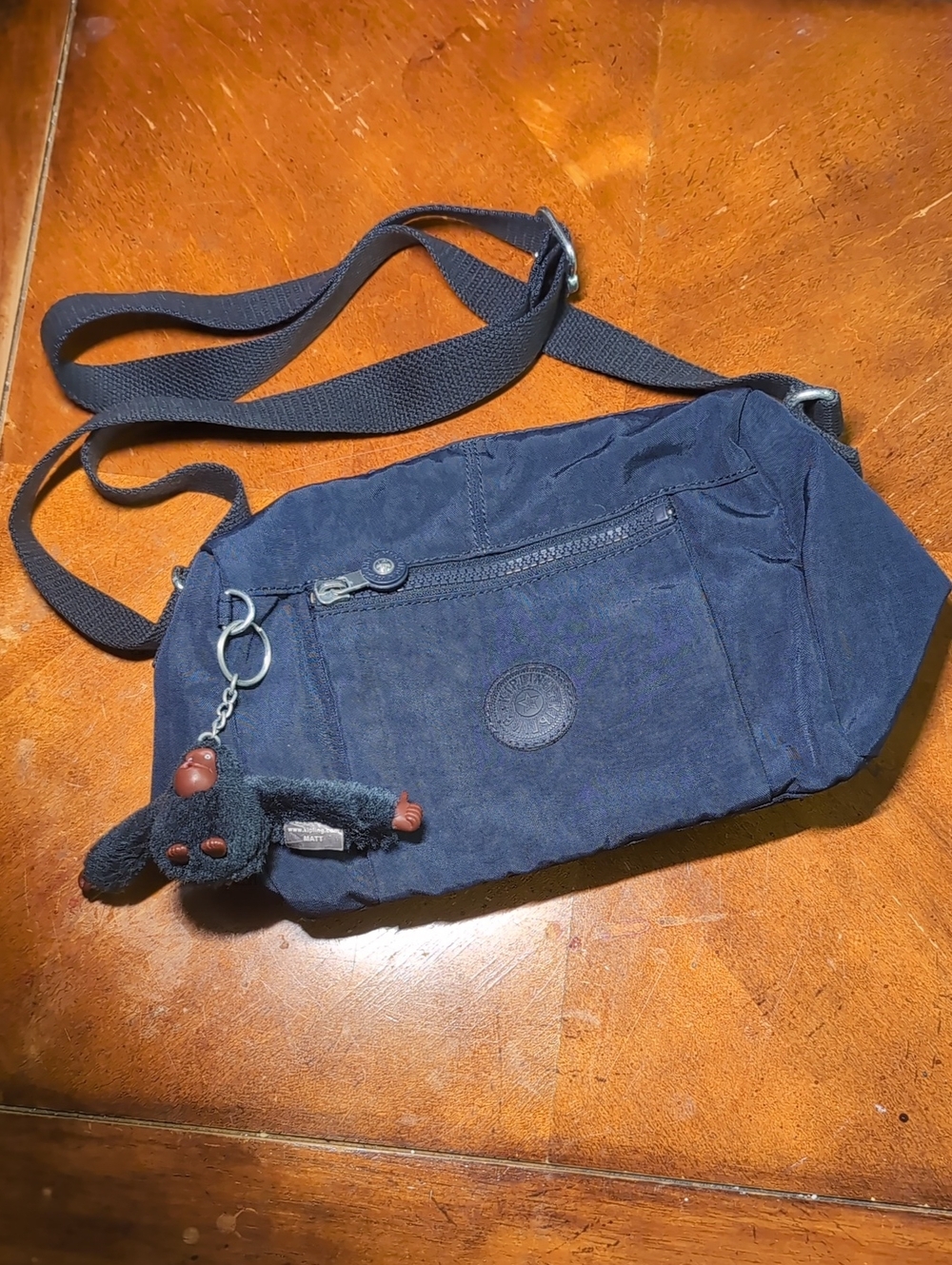 Kipling Dark Blue Crossbody Belt Bag with Monkey Keychain